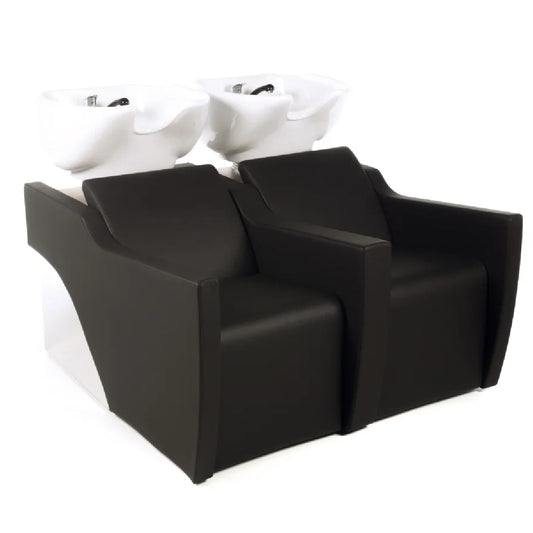 Black salon shampoo chair with white ceramic sink