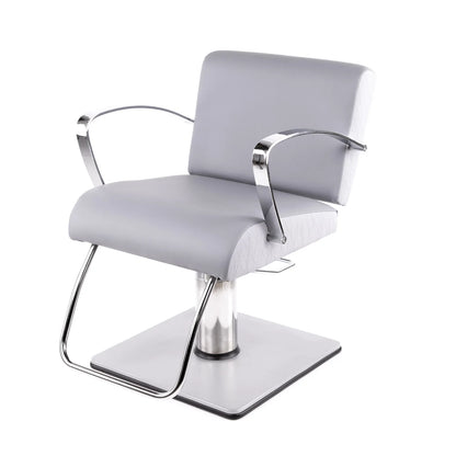 Gray salon chair with chrome frame on a white background