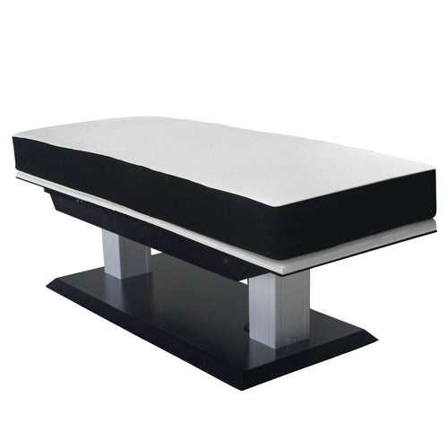 Adjustable multi-purpose treatment table for spa and wellness centers