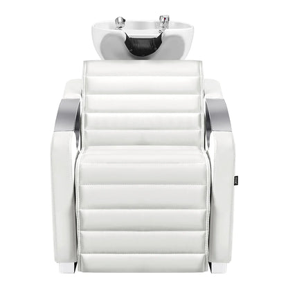 White salon chair with a sink above it on a white background