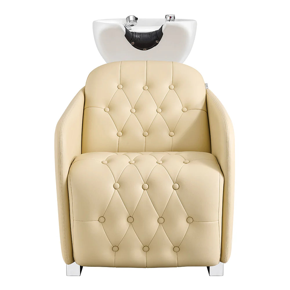 Beige salon chair with a white basin on a white background