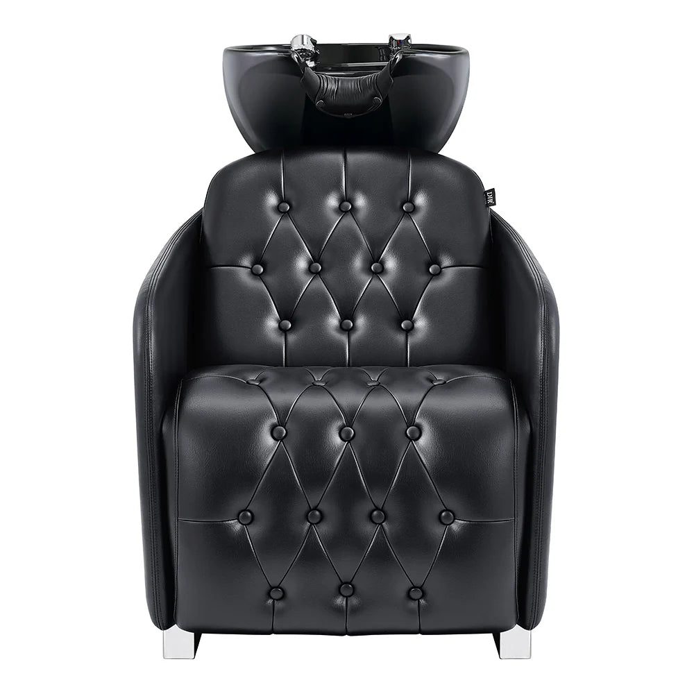 Black leather salon chair with built-in headrest on a white background