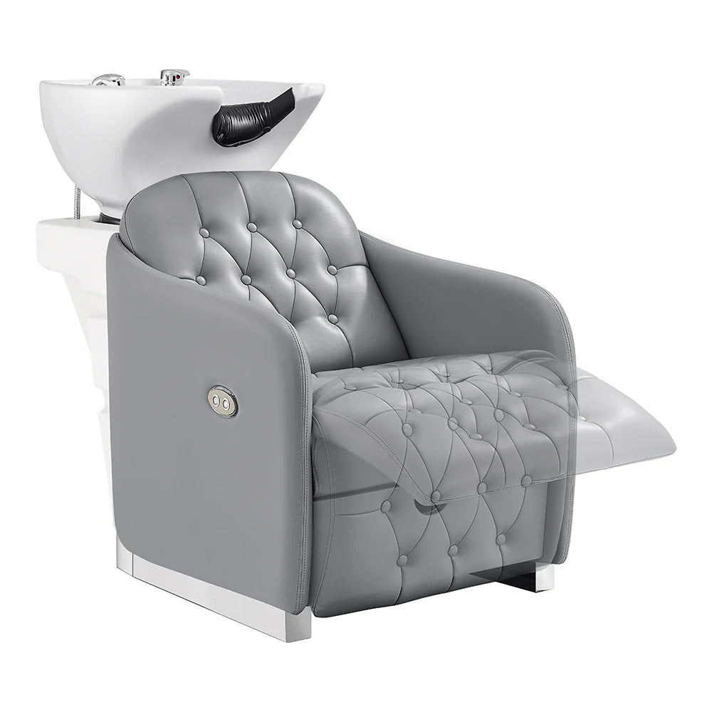 Gray salon chair with built-in sink on a white background
