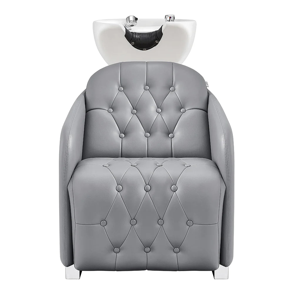 Gray salon chair with white basin on a white background